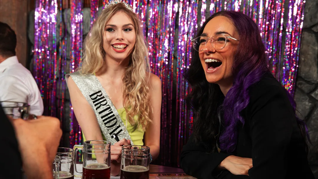 Guests celebrating at a Milwaukee murder mystery party