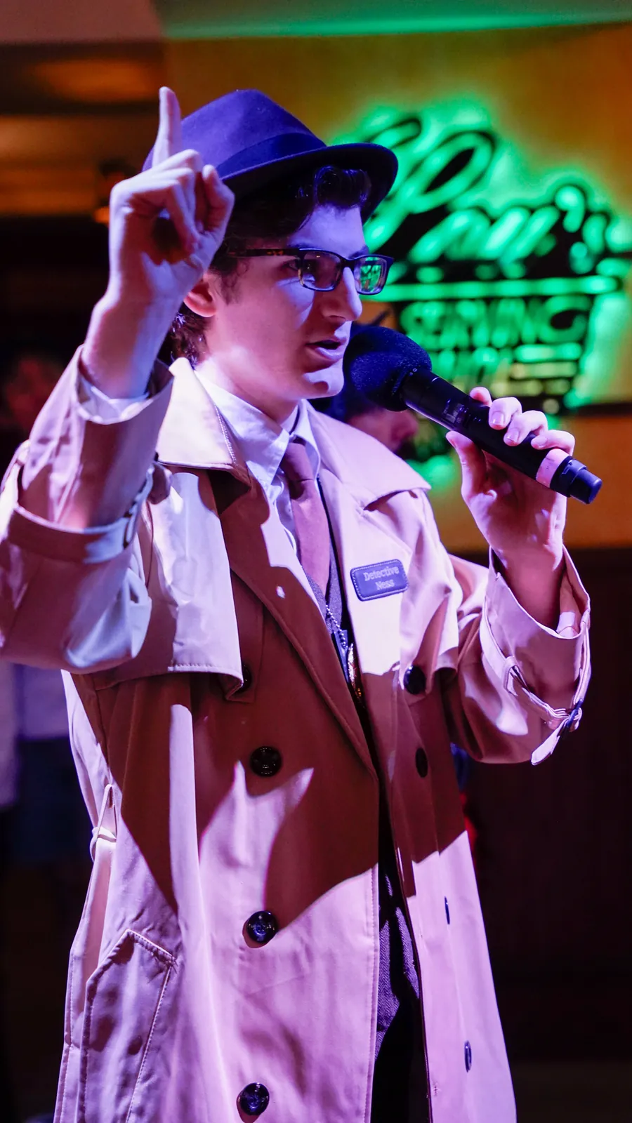 A Murder Mystery Company actor working the room at a Milwaukee show
